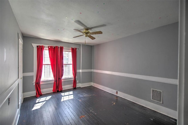 1470 W Decatur St, Decatur, IL 62522 - unfurnished room with a ceiling fan, a textured ceiling, and wood-type flooring