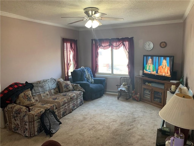 living room featuring a textured ceiling, ceiling fan, ornamental molding, and carpet