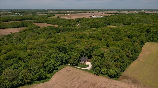 drone / aerial view of a heavily wooded area