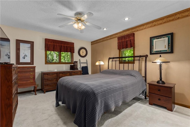 bedroom with light colored carpet, baseboards, a textured ceiling, recessed lighting, and ceiling fan