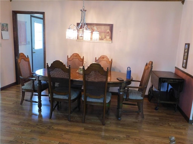 205 Monroe St, Toledo, IL 62468 - dining room with wood finished floors and a chandelier