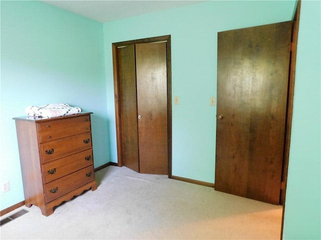205 Monroe St, Toledo, IL 62468 - bedroom with light colored carpet and a closet