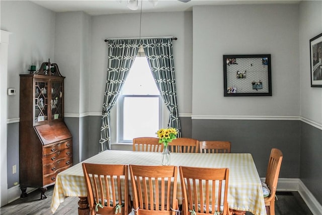 3416 Western Ave, Mattoon, IL 61938 - dining space featuring wood finished floors, baseboards, and ceiling fan