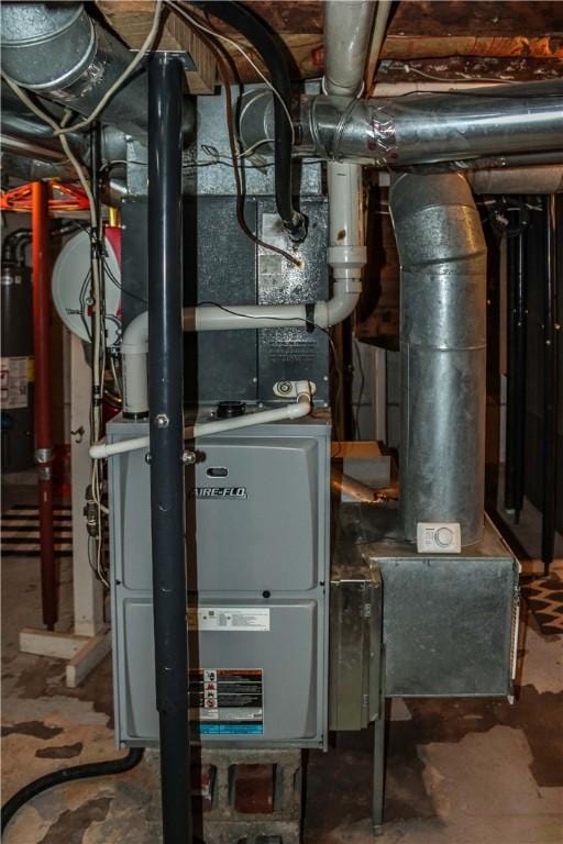 3416 Western Ave, Mattoon, IL 61938 - utility room featuring gas water heater