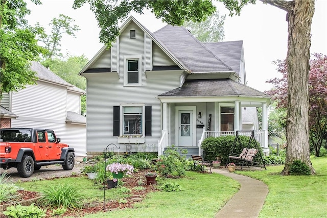 3416 Western Ave, Mattoon, IL 61938 - view of front of property featuring a porch and a front yard