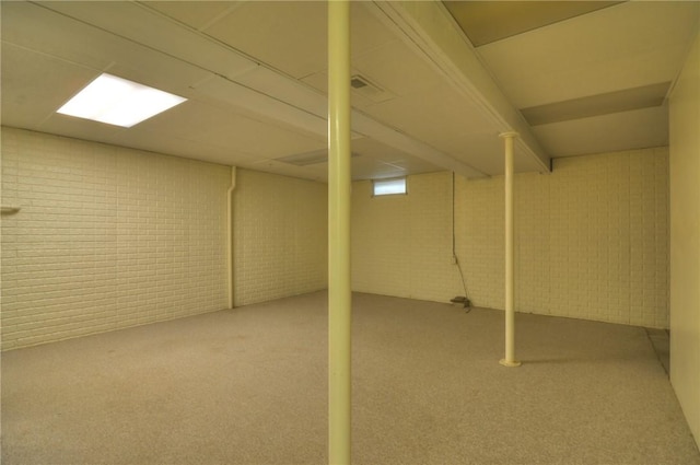 1225 W Pineview Ct, Decatur, IL 62526 - basement with brick wall and carpet floors