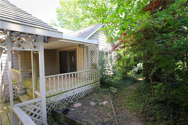 1225 W Pineview Ct, Decatur, IL 62526 - view of property exterior with roof with shingles and a deck