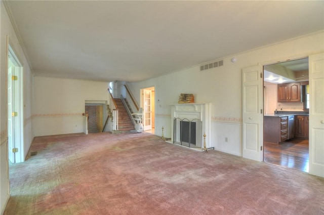 1225 W Pineview Ct, Decatur, IL 62526 - unfurnished living room with dark carpet, stairs, and a fireplace