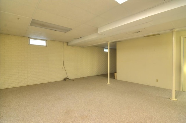 1225 W Pineview Ct, Decatur, IL 62526 - basement with light carpet and a drop ceiling