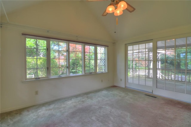1225 W Pineview Ct, Decatur, IL 62526 - empty room with healthy amount of natural light, lofted ceiling, carpet flooring, and ceiling fan