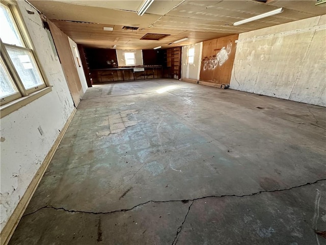 interior space featuring unfinished concrete flooring