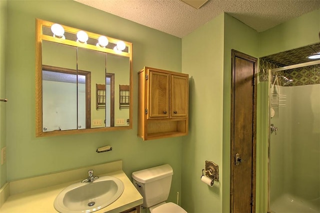 3103 N Oakland Ave, Decatur, IL 62526 - bathroom with a stall shower, toilet, vanity, and a textured ceiling