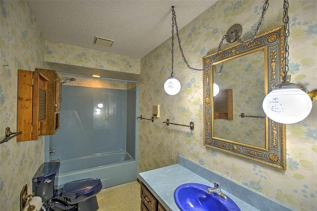 3103 N Oakland Ave, Decatur, IL 62526 - full bath featuring wallpapered walls, a textured ceiling, vanity, shower / bathtub combination, and toilet