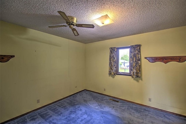 3103 N Oakland Ave, Decatur, IL 62526 - spare room featuring carpet floors, a textured ceiling, ceiling fan, and baseboards