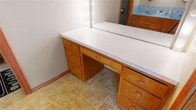 29 Peckerwood Ct, Bethany, IL 61914 - bathroom featuring baseboards and vanity