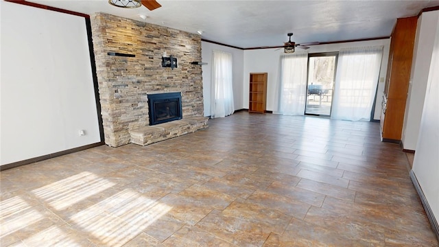 29 Peckerwood Ct, Bethany, IL 61914 - unfurnished living room with ceiling fan, a fireplace, ornamental molding, and baseboards