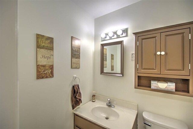 940 Kirk Dr, Mt Zion, IL 62549 - bathroom featuring vanity and toilet