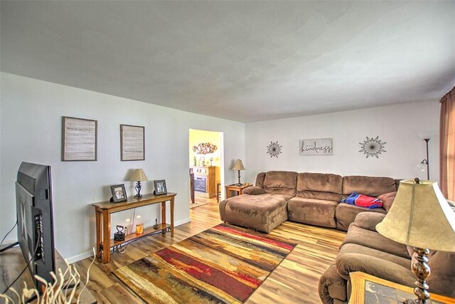 940 Kirk Dr, Mt Zion, IL 62549 - living area with wood finished floors and baseboards
