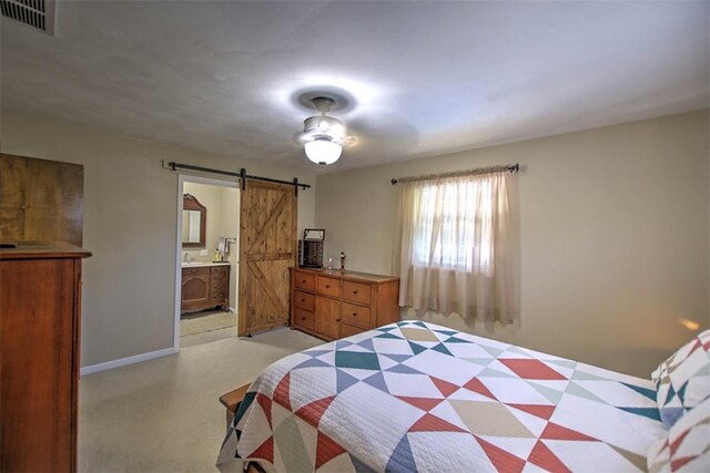 940 Kirk Dr, Mt Zion, IL 62549 - bedroom with a barn door and connected bathroom