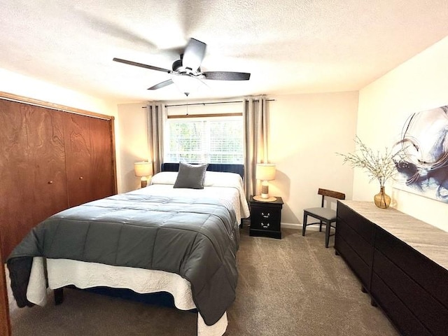 20786 Heritage Ln, Marshall, IL 62441 - bedroom with a textured ceiling, a closet, carpet flooring, and a ceiling fan