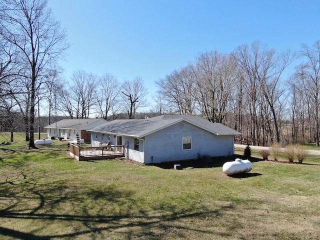 20786 Heritage Ln, Marshall, IL 62441 - back of property featuring a wooden deck and a lawn