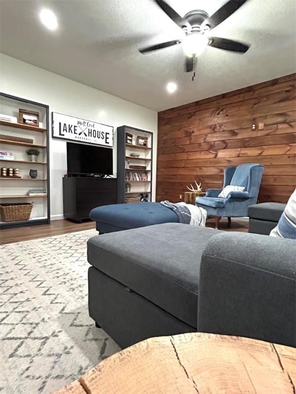 20786 Heritage Ln, Marshall, IL 62441 - living room featuring wooden walls, ceiling fan, and wood finished floors