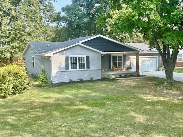 20786 Heritage Ln, Marshall, IL 62441 - ranch-style house with a porch, a garage, brick siding, a front lawn, and driveway