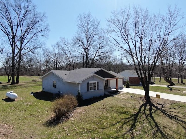 20786 Heritage Ln, Marshall, IL 62441 - view of side of home featuring driveway and a lawn