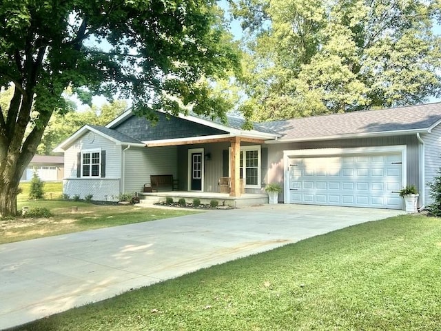 20786 Heritage Ln, Marshall, IL 62441 - ranch-style house with a porch, an attached garage, driveway, and a front lawn