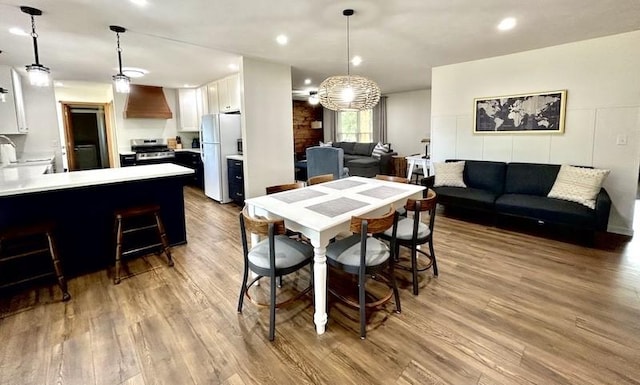 20786 Heritage Ln, Marshall, IL 62441 - dining area featuring recessed lighting, a notable chandelier, and wood finished floors