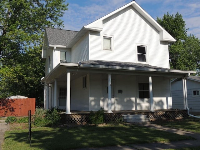 401 3rd St, Altamont, IL 62411 - back of property featuring covered porch and a shingled roof