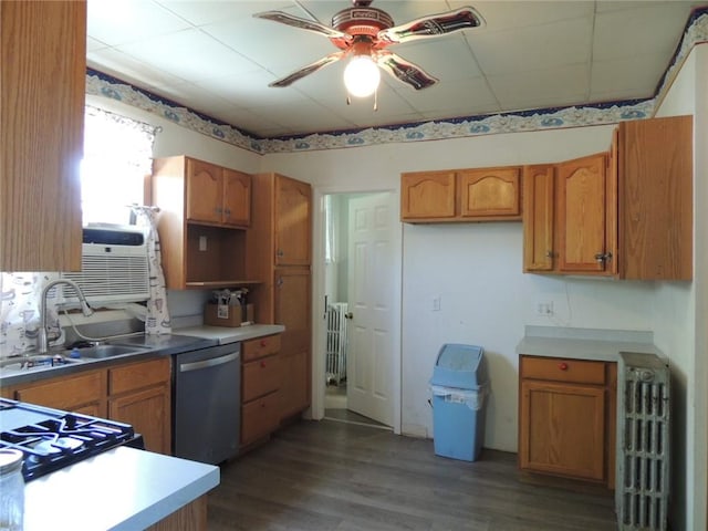 401 3rd St, Altamont, IL 62411 - kitchen with dishwasher, a sink, a ceiling fan, radiator, and brown cabinetry