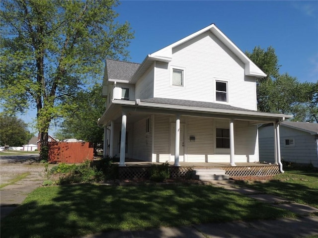 401 3rd St, Altamont, IL 62411 - farmhouse inspired home featuring a porch and a front lawn