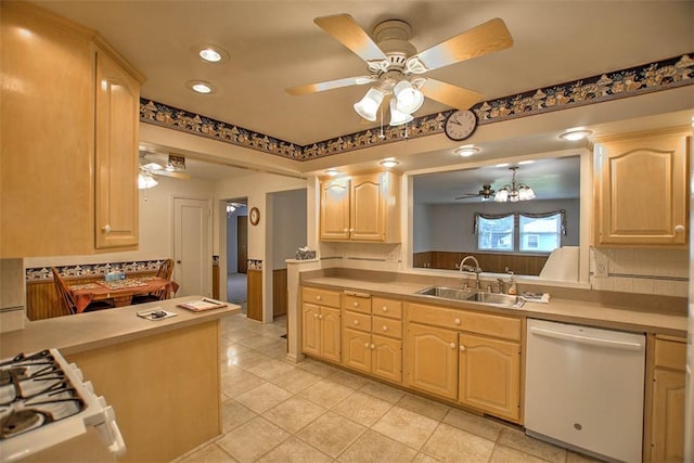 3204 Meadow Ln, Decatur, IL 62521 - kitchen with white dishwasher, light brown cabinetry, ceiling fan, light countertops, and light tile patterned flooring