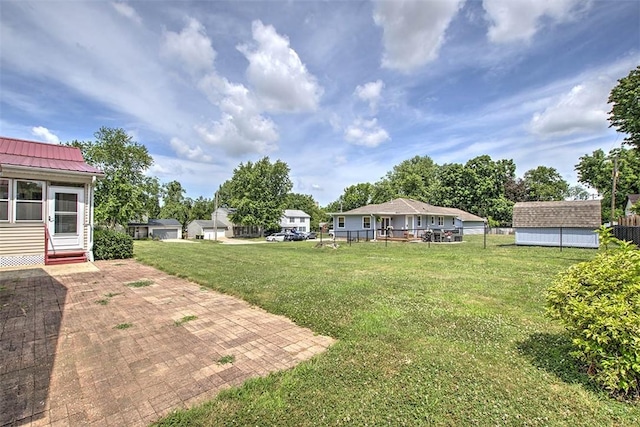 3204 Meadow Ln, Decatur, IL 62521 - view of yard with entry steps and an outbuilding