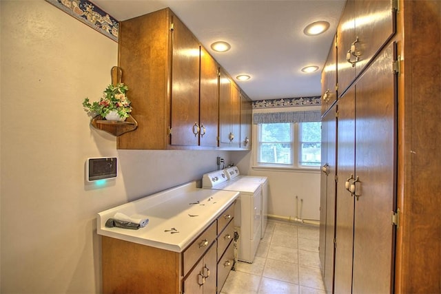 3204 Meadow Ln, Decatur, IL 62521 - washroom with washer and clothes dryer, cabinet space, recessed lighting, and light tile patterned floors