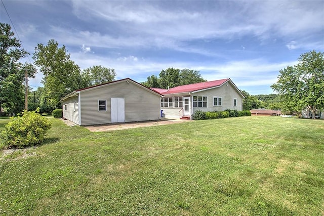 3204 Meadow Ln, Decatur, IL 62521 - back of property with a lawn