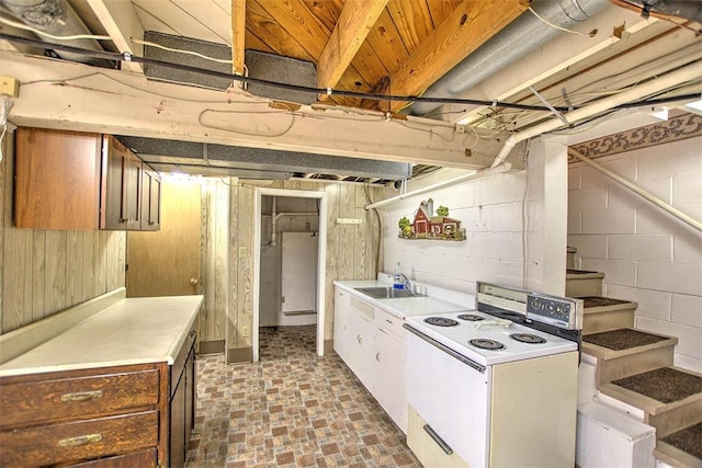 3204 Meadow Ln, Decatur, IL 62521 - kitchen featuring electric range, light countertops, and wood walls