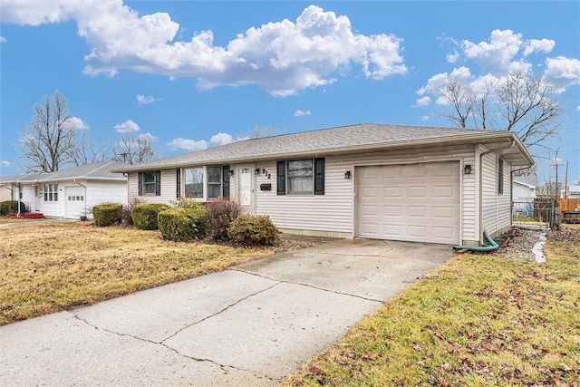 ranch-style house featuring a garage, concrete driveway, a front yard, and fence