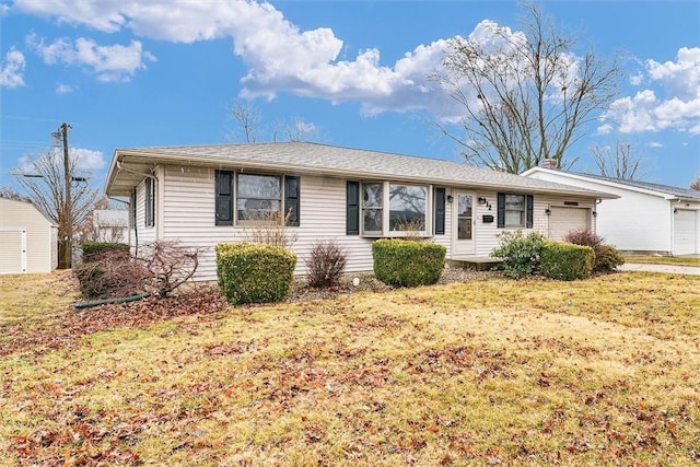 ranch-style house featuring an attached garage