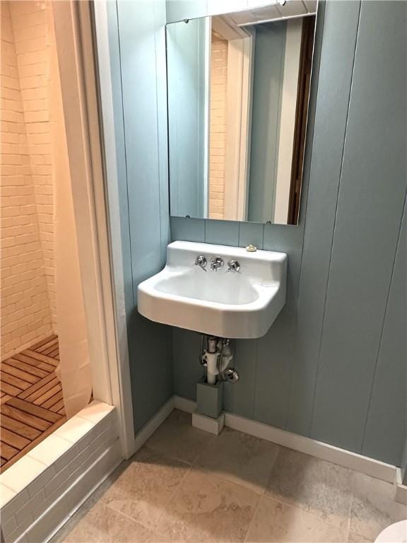 bathroom featuring tile patterned flooring