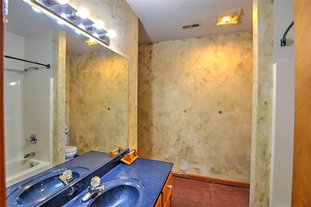 full bathroom with shower / bathing tub combination, vanity, and toilet