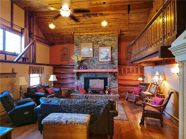 1622 S Cross St, Robinson, IL 62454 - living room featuring a fireplace, hardwood / wood-style flooring, a ceiling fan, wooden ceiling, and high vaulted ceiling