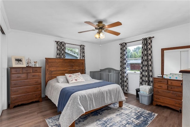 1022 Penguin St, Effingham, IL 62401 - bedroom with multiple windows, wood finished floors, ornamental molding, and a ceiling fan