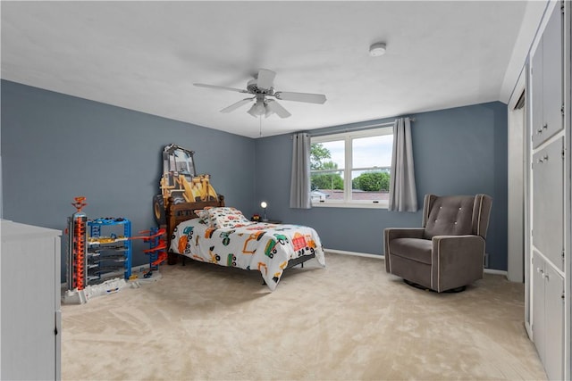 1022 Penguin St, Effingham, IL 62401 - bedroom with light carpet, baseboards, and ceiling fan