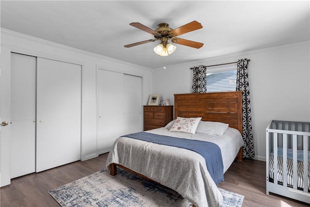 1022 Penguin St, Effingham, IL 62401 - bedroom featuring two closets, wood finished floors, ornamental molding, and a ceiling fan