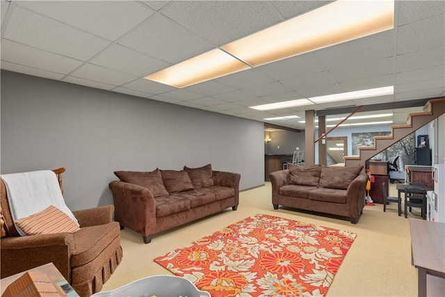 1022 Penguin St, Effingham, IL 62401 - living room with carpet, stairway, and a paneled ceiling