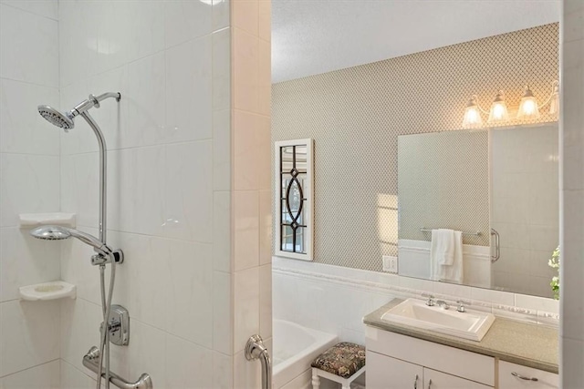 bathroom with plus walk in shower and vanity