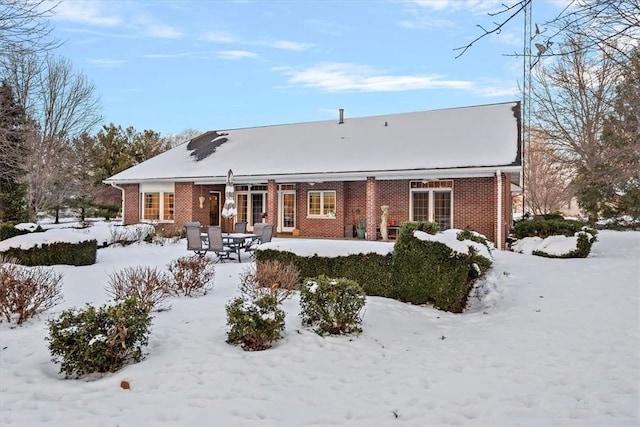 view of snow covered property