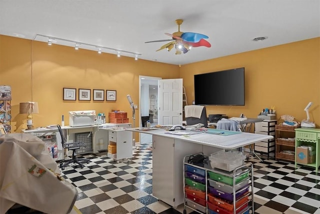 home office featuring ceiling fan and track lighting